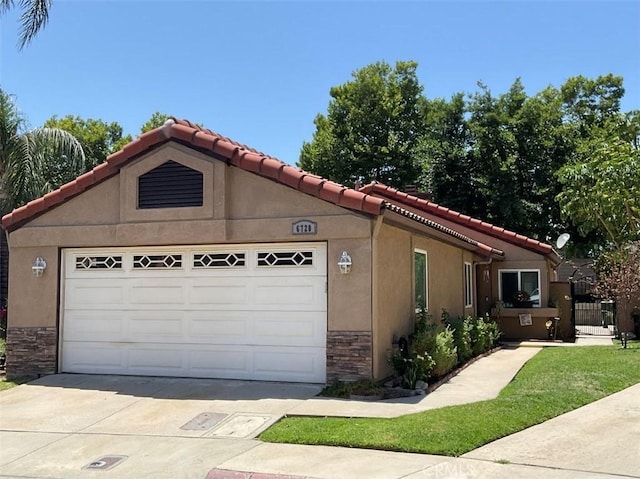 6720 Shaded Wood Pl, Rancho Cucamonga, CA 91701 - view of front of property with stone siding, an attached garage, a tiled roof, and concrete driveway