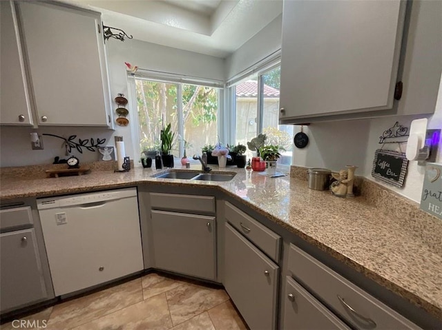 6720 Shaded Wood Pl, Rancho Cucamonga, CA 91701 - kitchen featuring white dishwasher and light countertops