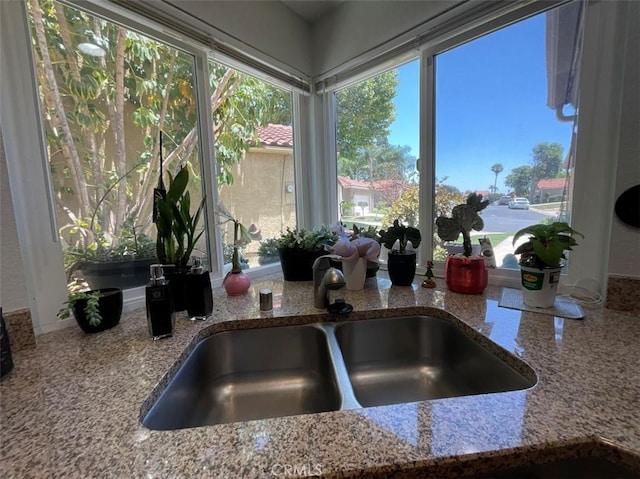 6720 Shaded Wood Pl, Rancho Cucamonga, CA 91701 - kitchen view of a sink and stone countertops