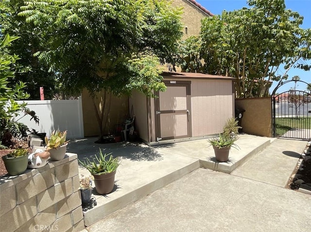 6720 Shaded Wood Pl, Rancho Cucamonga, CA 91701 - view of patio / terrace featuring a shed and a gate