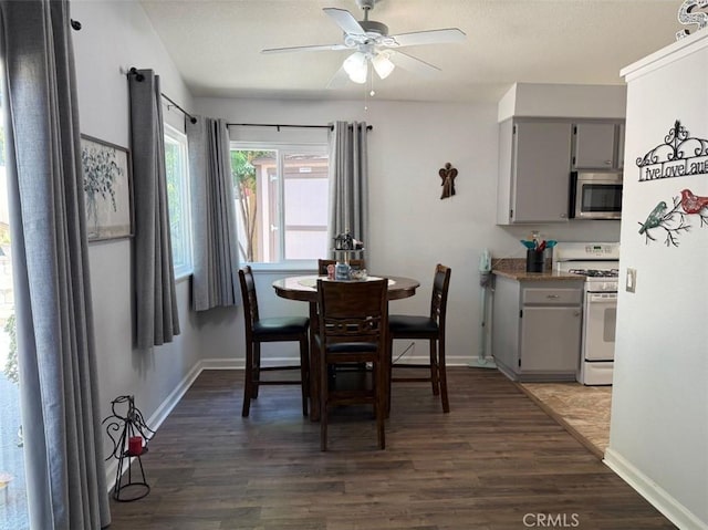 6720 Shaded Wood Pl, Rancho Cucamonga, CA 91701 - dining area with a ceiling fan and dark wood-type flooring