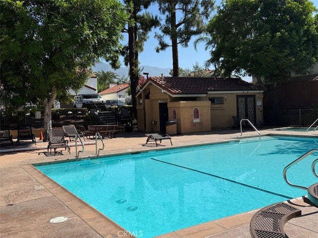 6720 Shaded Wood Pl, Rancho Cucamonga, CA 91701 - community pool featuring a patio