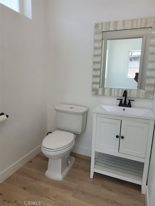 10531 Alexander Ave, South Gate, CA 90280 - bathroom featuring vanity and wood finished floors