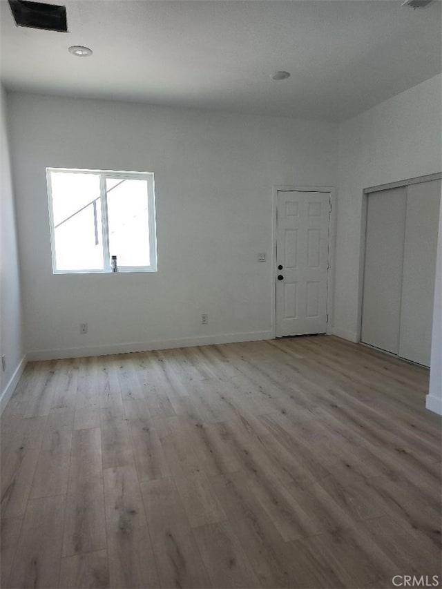 10531 Alexander Ave, South Gate, CA 90280 - unfurnished room featuring light wood finished floors and baseboards