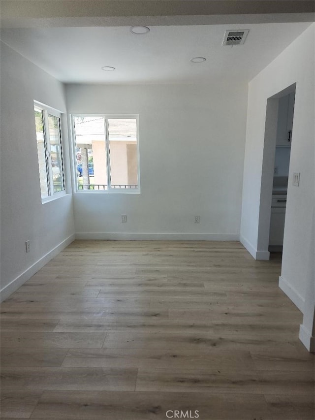 10531 Alexander Ave, South Gate, CA 90280 - unfurnished room with light wood-style floors and recessed lighting