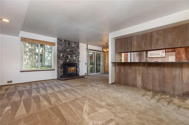 2113 Meridian Blvd Unit 133, Mammoth Lakes, CA 93546 - unfurnished living room with carpet floors and healthy amount of natural light