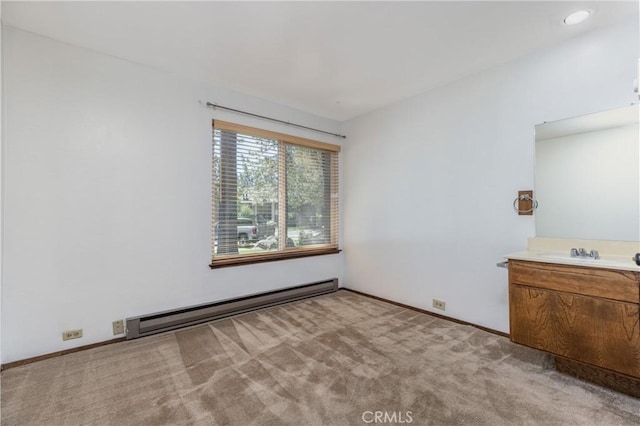2113 Meridian Blvd Unit 133, Mammoth Lakes, CA 93546 - unfurnished bedroom with a baseboard radiator and light carpet