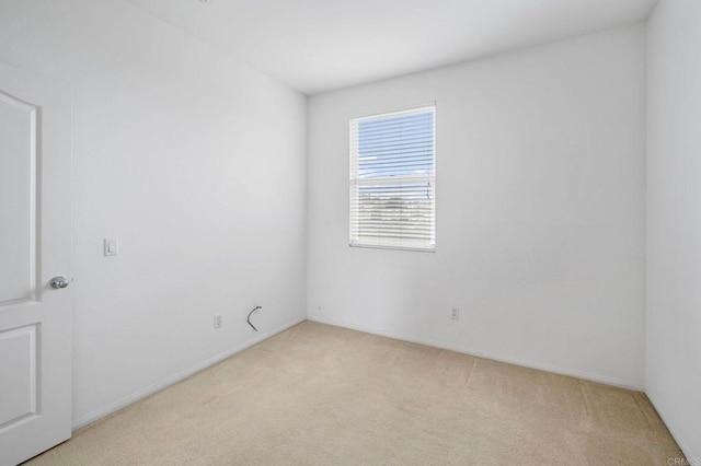 6410 Terraza Portico, Carlsbad, CA 92009 - unfurnished room featuring light carpet and baseboards