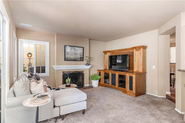 5620 La Paz St, Long Beach, CA 90803 - living room with carpet floors and a high end fireplace
