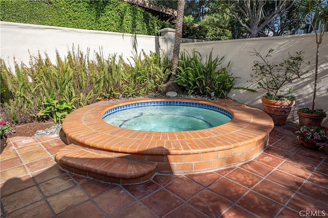 5620 La Paz St, Long Beach, CA 90803 - view of swimming pool with an in-ground hot tub and a patio area