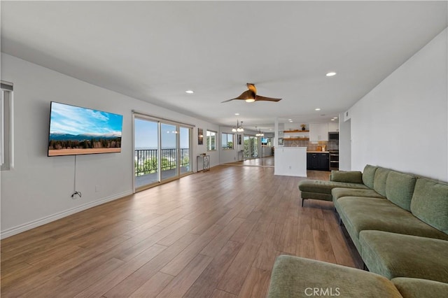 2700 E Panorama Dr Unit 208, Signal Hill, CA 90755 - living area with ceiling fan, light wood-type flooring, and recessed lighting