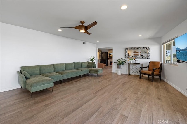 2700 E Panorama Dr Unit 208, Signal Hill, CA 90755 - living area featuring wood finished floors, recessed lighting, and ceiling fan