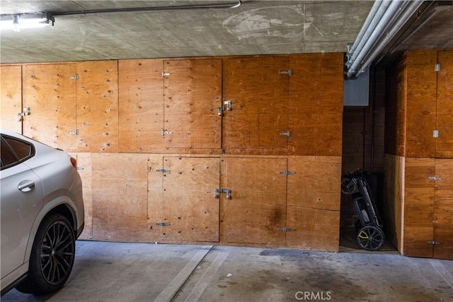 2700 E Panorama Dr Unit 208, Signal Hill, CA 90755 - parking garage featuring wood walls