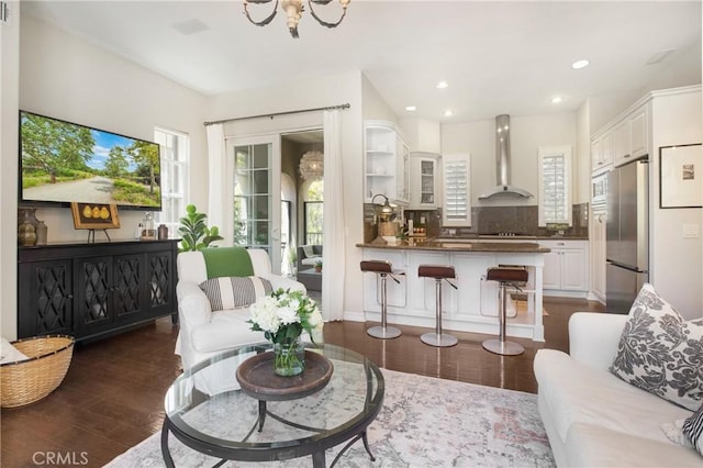 6 Via Amanti, Newport Coast, CA 92657 - living room featuring dark wood-style flooring, healthy amount of natural light, recessed lighting, and a chandelier