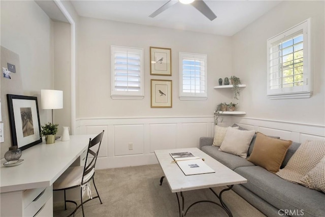 6 Via Amanti, Newport Coast, CA 92657 - carpeted living room with a decorative wall, ceiling fan, and wainscoting