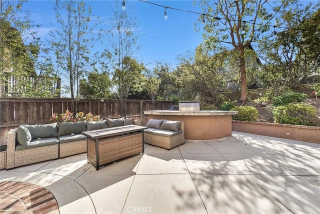 7059 E Monaco, Orange, CA 92867 - fenced backyard featuring an outdoor living space, a patio, and area for grilling