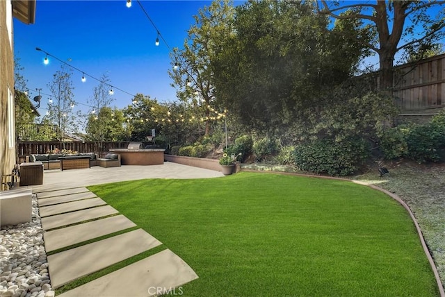 7059 E Monaco, Orange, CA 92867 - fenced backyard featuring a patio area and an outdoor living space