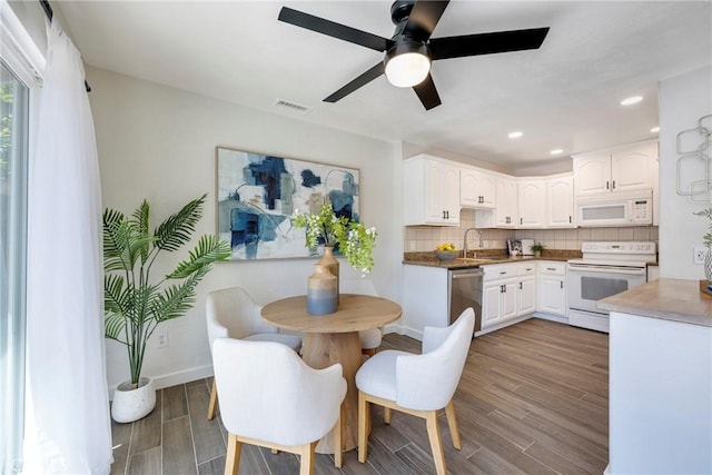 2302 Cayuga Ave, Placentia, CA 92870 - dining room featuring wood finished floors, ceiling fan, and recessed lighting