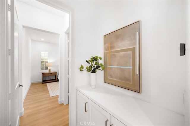 56 Cartwheel, Irvine, CA 92618 - hall featuring light wood-type flooring and baseboards