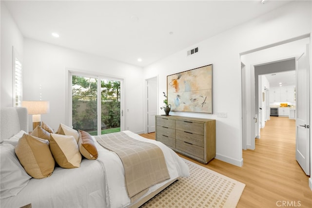 56 Cartwheel, Irvine, CA 92618 - bedroom featuring light wood-style floors, recessed lighting, and access to outside