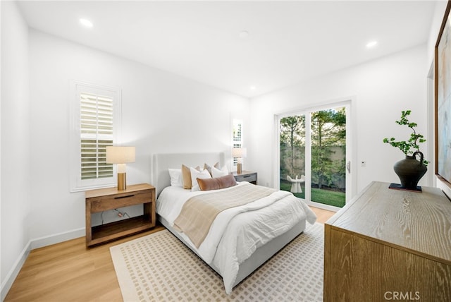 56 Cartwheel, Irvine, CA 92618 - bedroom with access to exterior, light wood-style floors, and recessed lighting