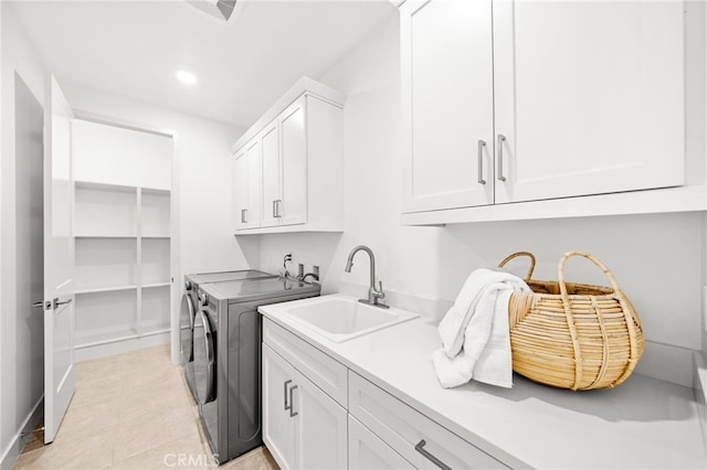 56 Cartwheel, Irvine, CA 92618 - laundry area featuring separate washer and dryer, cabinet space, recessed lighting, and light tile patterned flooring
