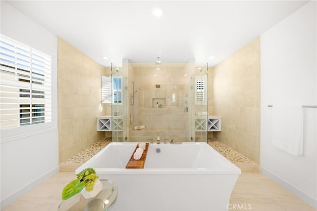 56 Cartwheel, Irvine, CA 92618 - bathroom featuring a soaking tub and walk in shower