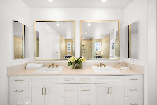 56 Cartwheel, Irvine, CA 92618 - bathroom featuring double vanity, a tile shower, and recessed lighting