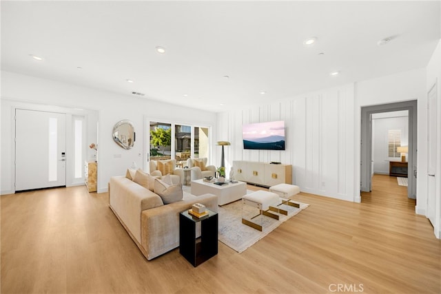 56 Cartwheel, Irvine, CA 92618 - living area with light wood-type flooring and recessed lighting