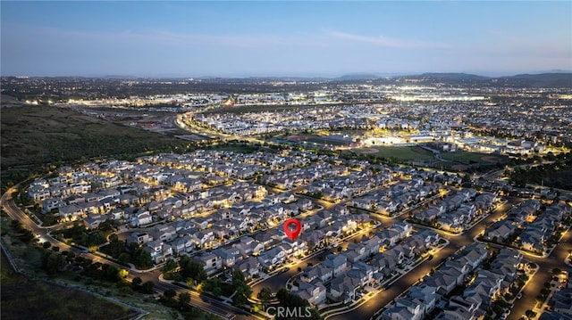56 Cartwheel, Irvine, CA 92618 - aerial overview of property's location with a mountainous background and nearby suburban area
