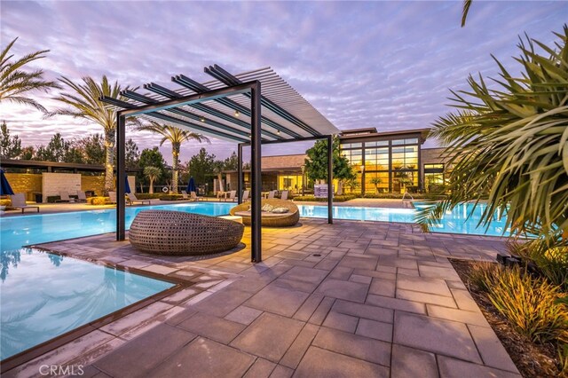 56 Cartwheel, Irvine, CA 92618 - community pool with a pergola and a patio area