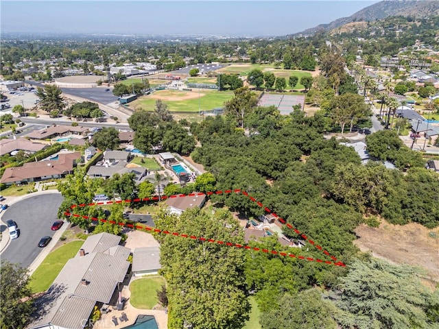 1125 Indian Springs Dr, Glendora, CA 91741 - aerial view of residential area featuring property boundaries highlighted and a mountainous background