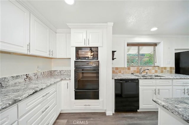 1125 Indian Springs Dr, Glendora, CA 91741 - kitchen featuring black appliances, a warming drawer, white cabinets, ornamental molding, and wood finished floors