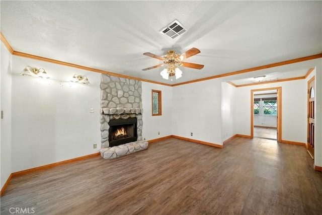 1125 Indian Springs Dr, Glendora, CA 91741 - unfurnished living room featuring ornamental molding, wood finished floors, a ceiling fan, and a stone fireplace