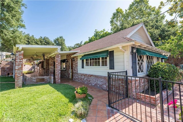 1125 Indian Springs Dr, Glendora, CA 91741 - view of front of house featuring a front yard, a gate, brick siding, and roof with shingles