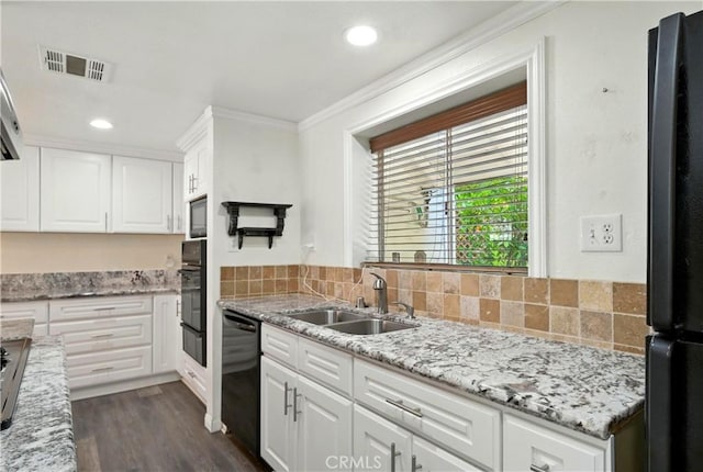 1125 Indian Springs Dr, Glendora, CA 91741 - kitchen featuring black appliances, ornamental molding, white cabinets, a warming drawer, and decorative backsplash