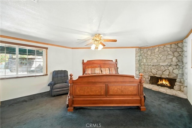 1125 Indian Springs Dr, Glendora, CA 91741 - bedroom with dark carpet, a stone fireplace, crown molding, and a ceiling fan