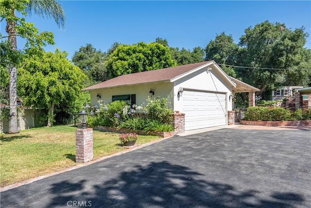 1125 Indian Springs Dr, Glendora, CA 91741 - view of front facade with stucco siding, a front lawn, asphalt driveway, and a garage