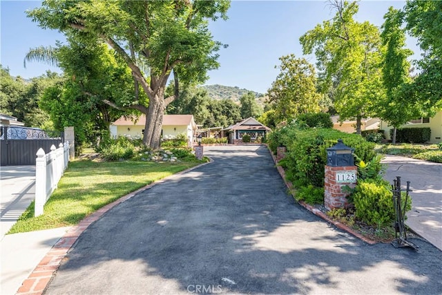 1125 Indian Springs Dr, Glendora, CA 91741 - view of front of house with a mountain view