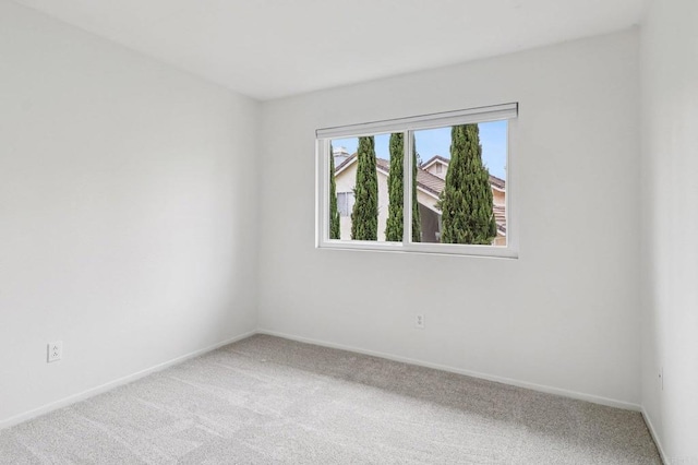 10559 Lansford Ln, San Diego, CA 92126 - carpeted spare room featuring baseboards