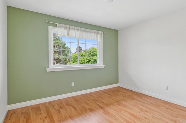 10559 Lansford Ln, San Diego, CA 92126 - empty room featuring baseboards and wood finished floors