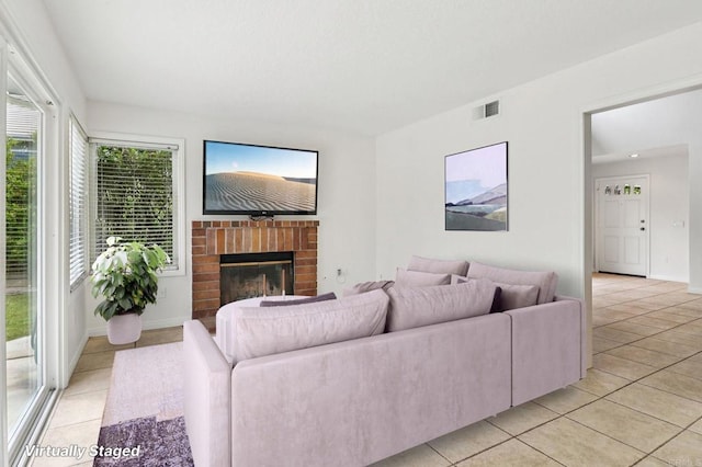 10559 Lansford Ln, San Diego, CA 92126 - living area with light tile patterned floors and a fireplace
