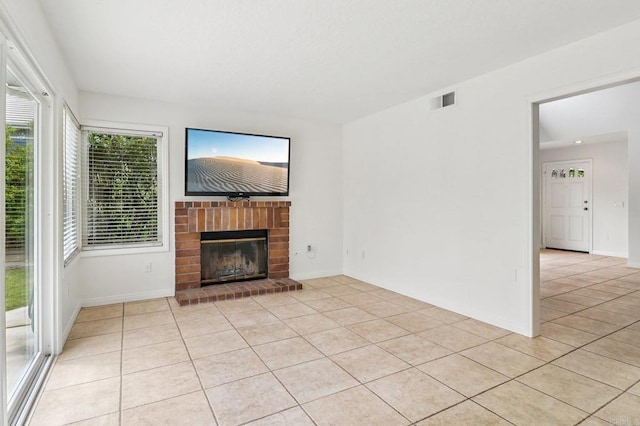 10559 Lansford Ln, San Diego, CA 92126 - unfurnished living room with light tile patterned flooring and a brick fireplace