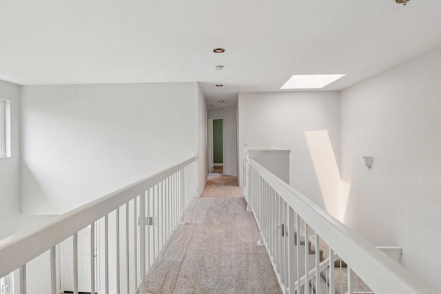 10559 Lansford Ln, San Diego, CA 92126 - hall featuring a skylight, carpet flooring, an upstairs landing, and recessed lighting