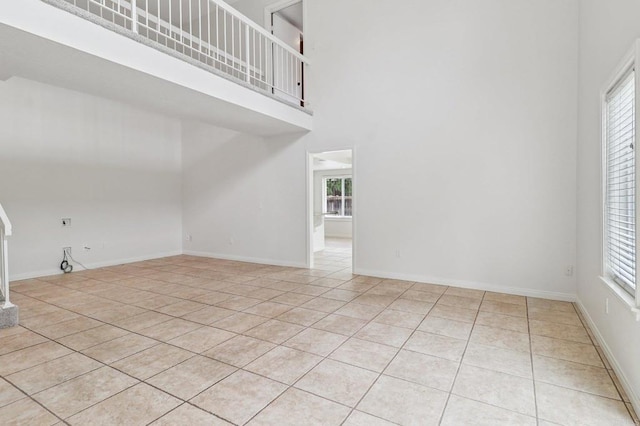 10559 Lansford Ln, San Diego, CA 92126 - unfurnished living room with light tile patterned floors and a high ceiling