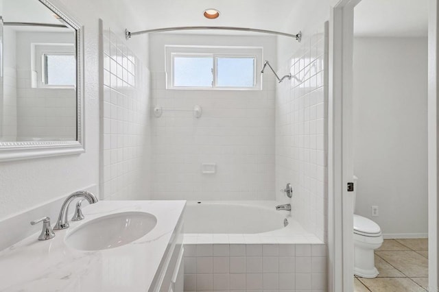 10559 Lansford Ln, San Diego, CA 92126 - bathroom with healthy amount of natural light, tiled shower / bath combo, vanity, and tile patterned flooring