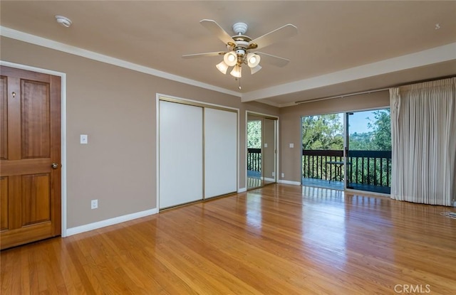 1835 Las Flores Dr, Glendale, CA 91207 - unfurnished bedroom featuring access to exterior, light wood finished floors, and a ceiling fan