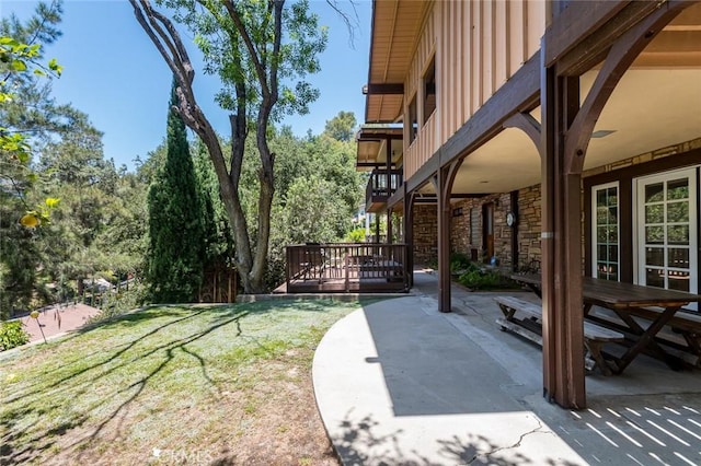 1835 Las Flores Dr, Glendale, CA 91207 - view of grassy yard with a patio area and a wooden deck
