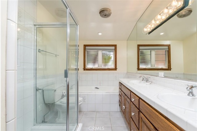 1835 Las Flores Dr, Glendale, CA 91207 - bathroom with tile patterned flooring, double vanity, a garden tub, and a shower stall