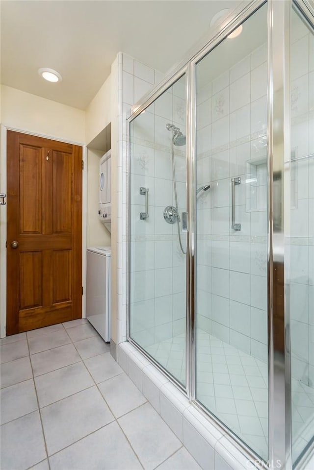1835 Las Flores Dr, Glendale, CA 91207 - full bath featuring stacked washing machine and dryer, tile patterned floors, and a shower stall